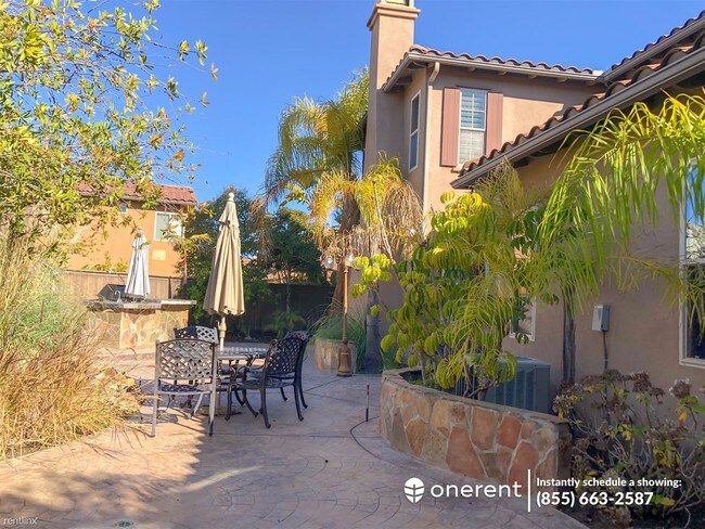 Foto del edificio - 5 br, 4 bath House - 7316 Caribou Ct -
