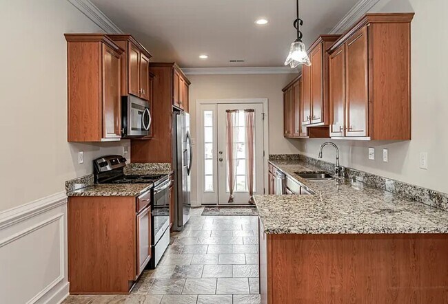 Foto del edificio - 7380 Pebble Lake Dr