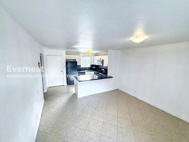 Building Photo - PROMO: Get ONE MONTH FREE when you sign a 15-month lease. / 2 Bed/2 Bath Condo with Essential Ame...