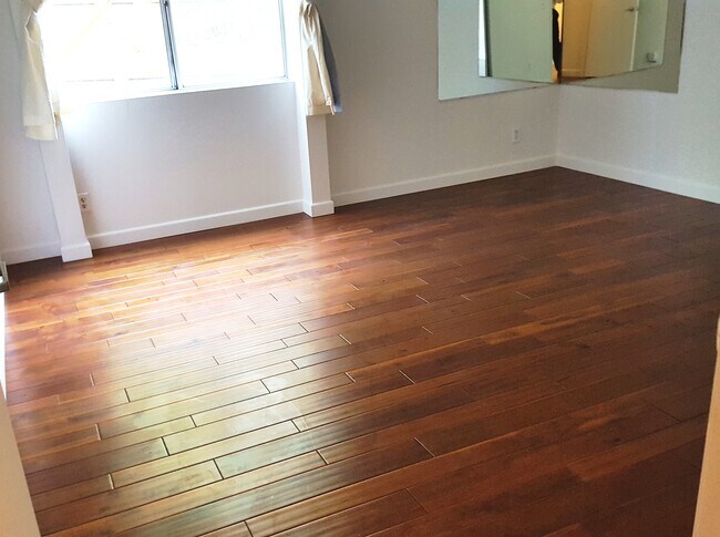 New Wood Floors - 112 N Hamilton Dr