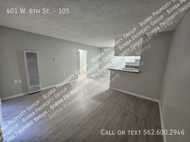 Foto del edificio - 401 W 6th St
