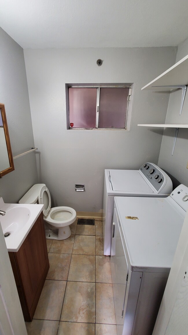 Half bath with washer/dryer - 3550 Carter Dr