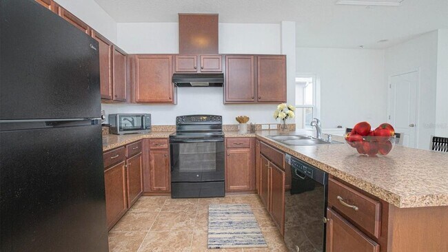 Foto del edificio - 8558 Tavistock Lakes Blvd