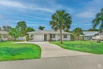 Building Photo - 6159 SE Poinciana Ln