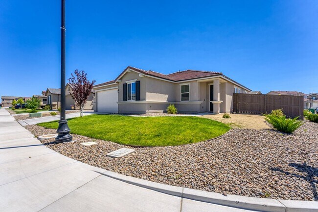 Foto del edificio - FULLY FURNISHED SPANISH SPRINGS HOME WITH HOT TUB & UTILITIES INCLUDED