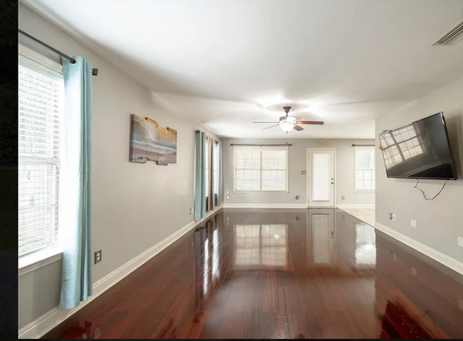 The Centerpiece of the lower floor is an expansive dining room and living room! Looking East. - 12366 Copperwood Dr