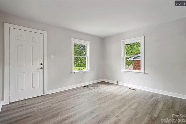 Living room looking at front door - 1032 Rodey Ave