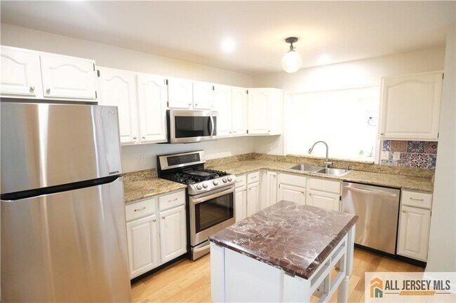 Building Photo - 56 Coriander Dr