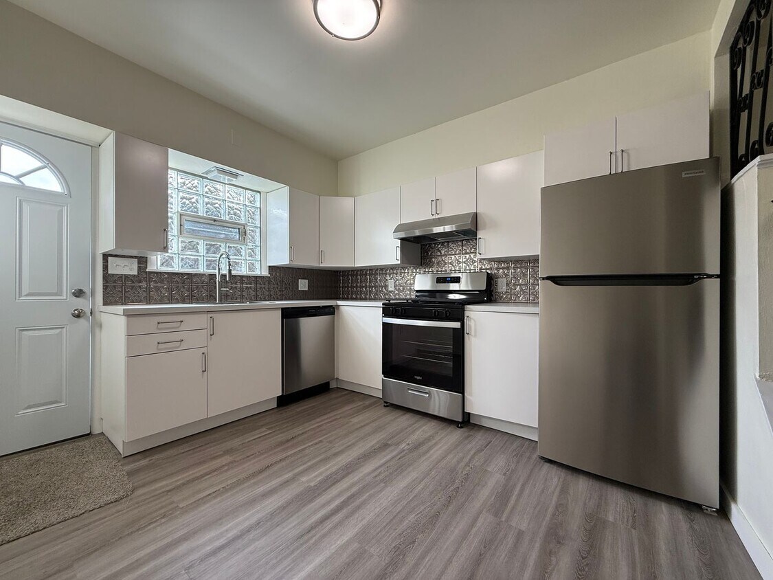 Primary Photo - Newly updated 2BR house with yard, off str...