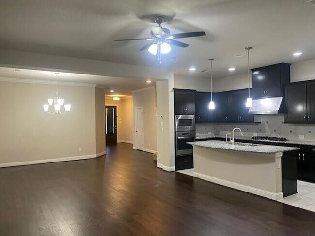 Building Photo - Breathtaking 4-bedroom home in the highly ...