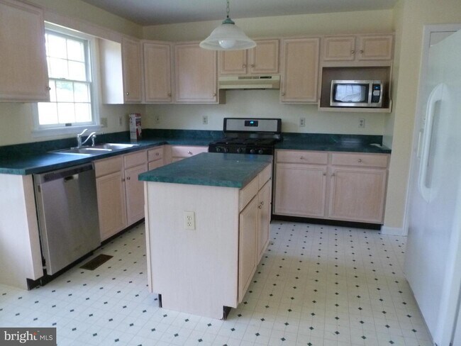 Foto del edificio - 5014 Muirfield Pl