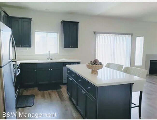 Building Photo - 4 br, 3 bath House - 1534 S. Loyola Ct.