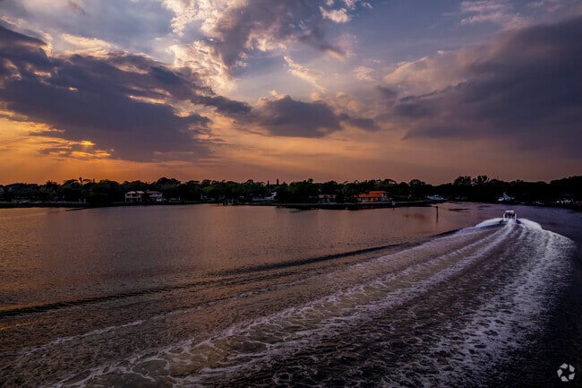 Take a sunset boat ride with your favorite people when you live in Coquina Key.