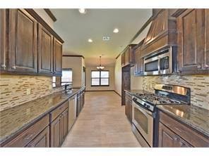 Building Photo - 4 bedroom/3 Car Garage Home in the Grove- Deer Creek Schools- Storm Shelter
