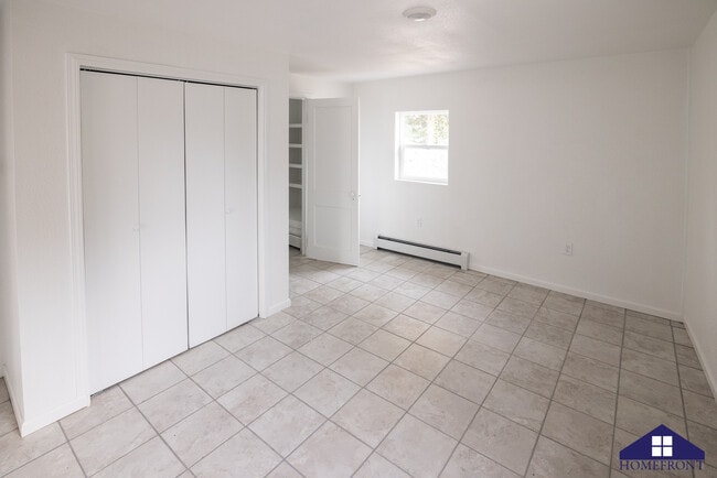 View across bedroom to closet and bath - 502 S 1st St