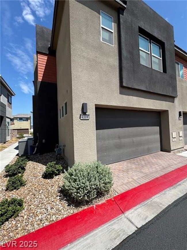 Building Photo - Modern Furnished Optional 3 Bedroom Townhome in Prime Southern Highlands Location