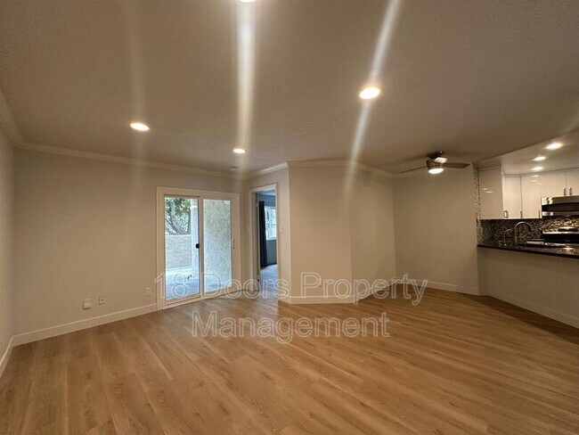 Building Photo - 7565 Charmant Drive Unit 411