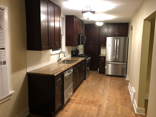 NEW Kitchen. Lots of new wood cabinet, soft close, storage. - 1005 Algonquin Road