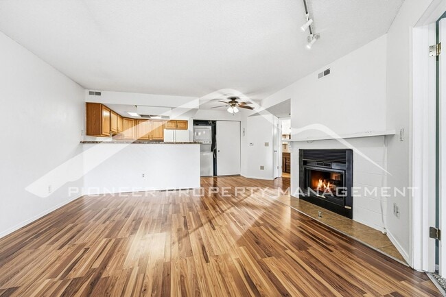 Building Photo - Charming Condo with Washer/Dryer and Gas Fireplace