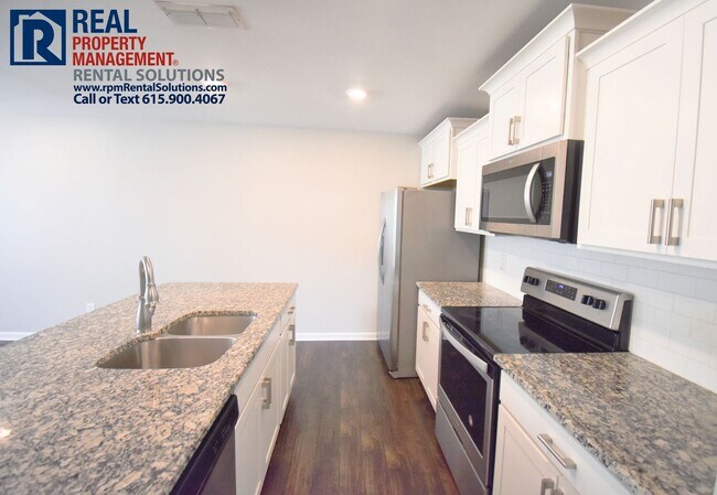 Building Photo - Gorgeous luxury 2BD/2.5BA M'boro townhome ...