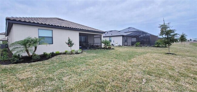 Foto del edificio - 15719 Islandwalk Ave