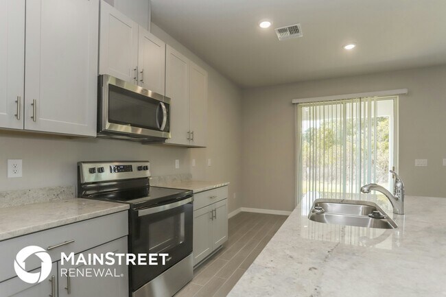 Foto del edificio - 1820 Woodleaf Hammock Ct