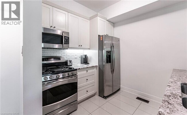 Photo du bâtiment - 1401 Plains Rd E
