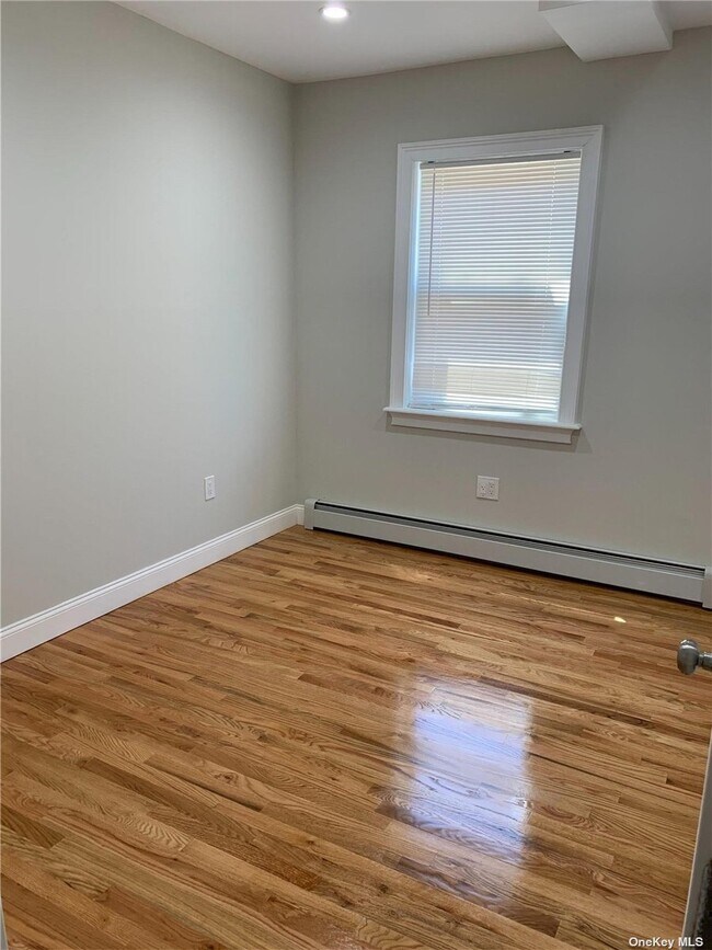 Building Photo - 205-15 100th Ave