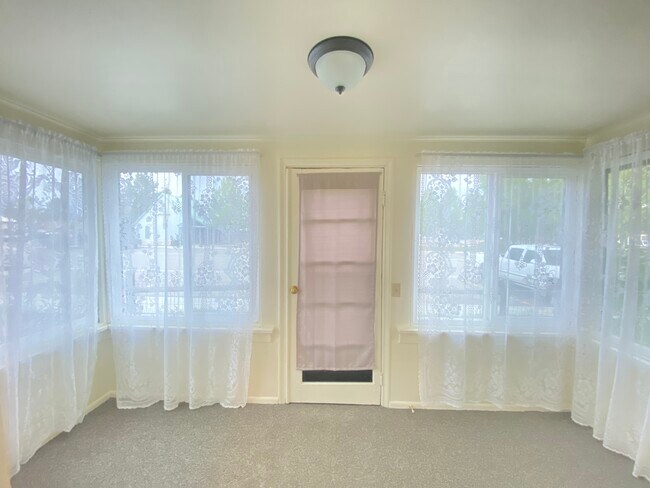 Covered porch entry - 136 S Maybell Ave