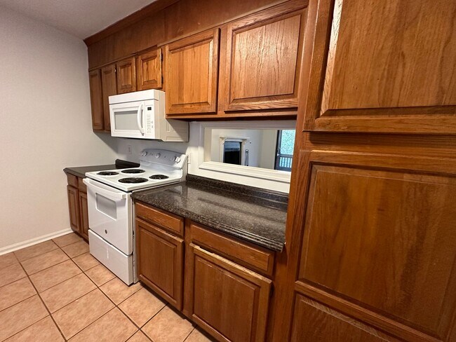 Building Photo - Hidden Gem in Tranquil, Wooded Setting