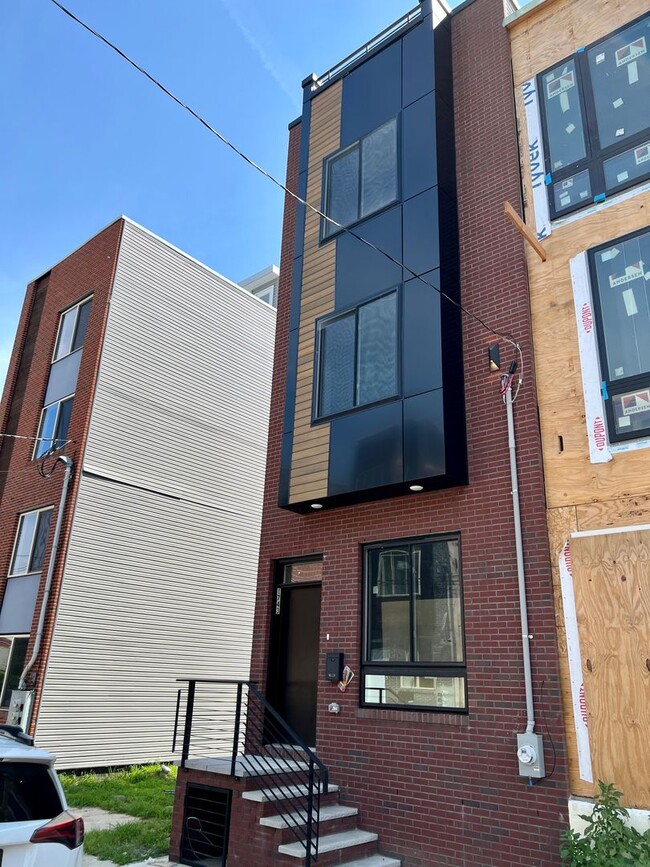 Building Photo - New Construction 3-Bedroom Townhome with F...