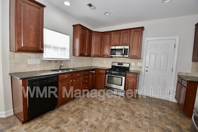 Foto del edificio - 517 Dock Side Ln NW