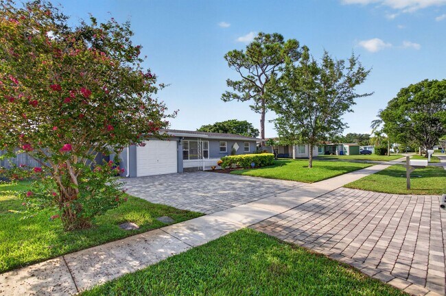 Building Photo - Poolside Living in Pompano Beach – 3 Bed 2 Bath Single Family Home - NO HOA move in today!