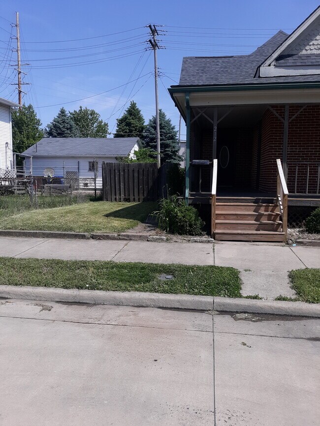 Building Photo - **Rent to Own** 1880 Red Brick home, Full ...