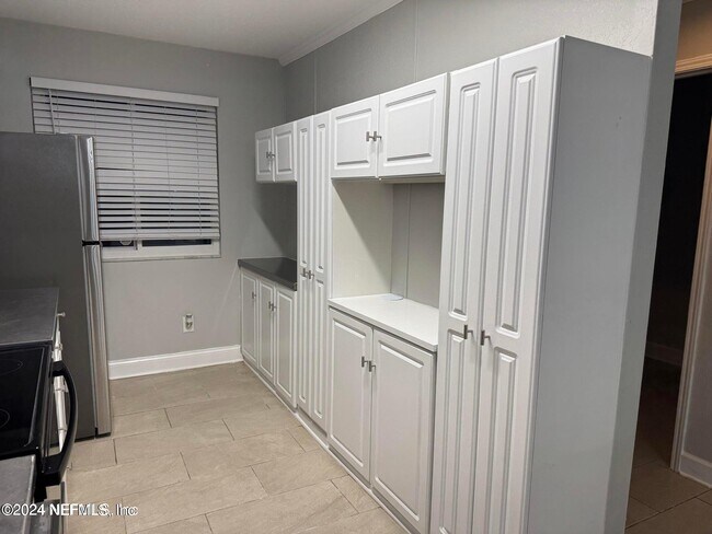 Building Photo - 11648 Dunes Way Dr N