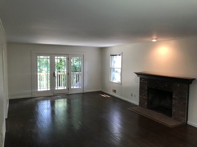 Living Room with Fireplace - 10 Sickle Bar Ln