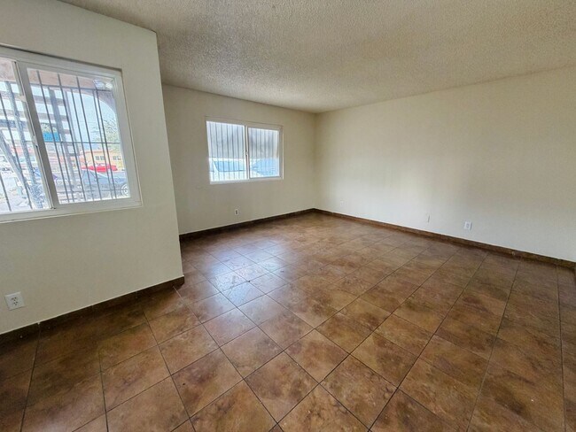 Building Photo - **TWO WEEKS FREE RENT!! ACCEPTS SECTION 8!!** Spacious first floor apartment with large living ro...