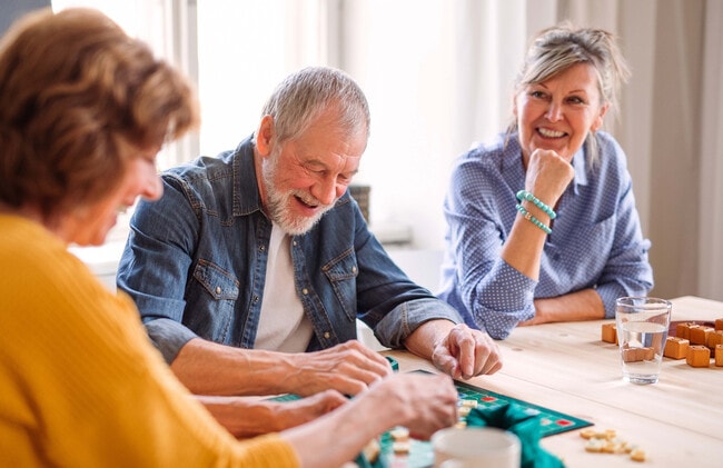 Group playing a game together - The Summerfield 62+ Community