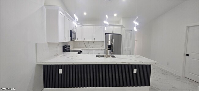 Foto del edificio - 4927 Leonard Blvd S