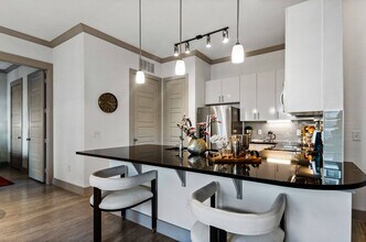 Building Photo - Reveal at Bayside