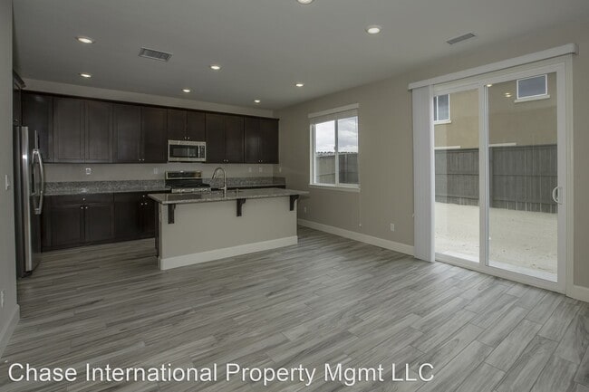Building Photo - 4 br, 3.5 bath House - 7166 Eldridge Street