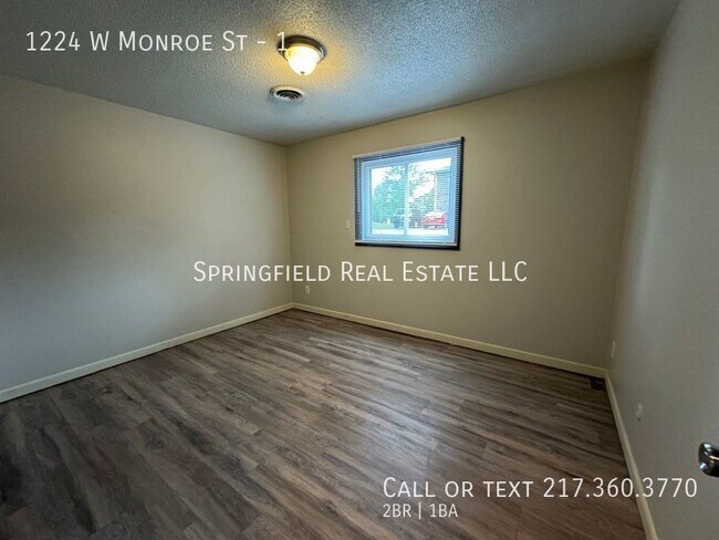 Building Photo - Down-to-Earth Elegance: Charming 2 Bed, 1 ...