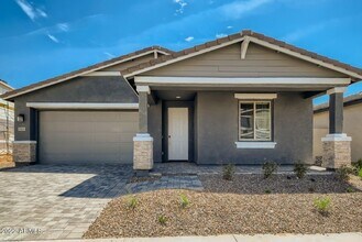 Building Photo - 9405 E Saturn Ave