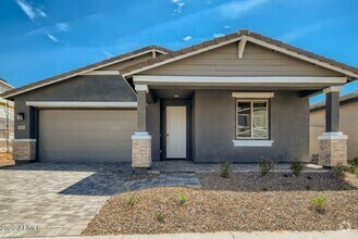 Building Photo - 9405 E Saturn Ave