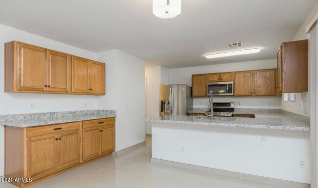 Building Photo - 9446 W Virginia Ave