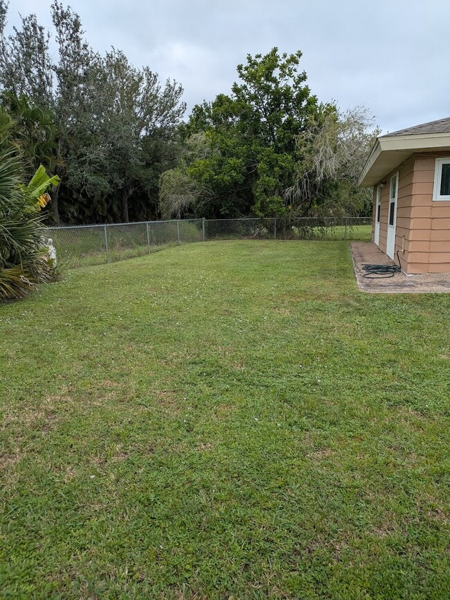 Fenced Backyard - 6485 Malaluka Rd