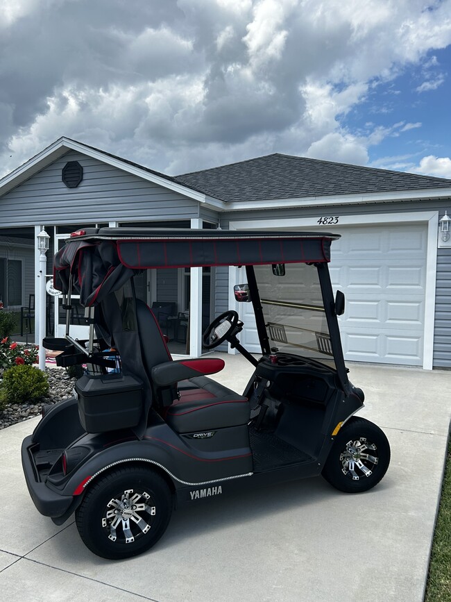 Courtesy 2 man golf cart - 4823 Angela Ave