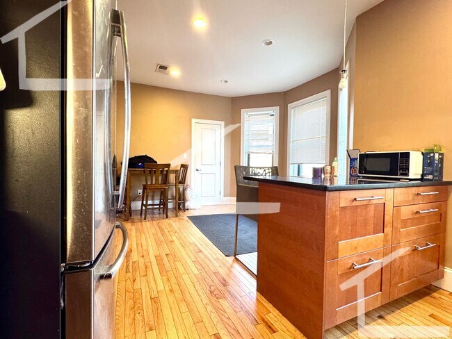 Building Photo - Brighton 5-Bed/2 Bath Near B, C, and D Lines with Laundry in Unit