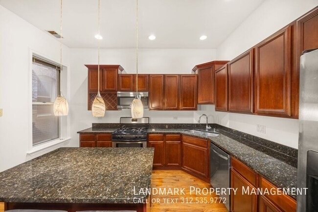 Foto del edificio - 4856 S Prairie Ave