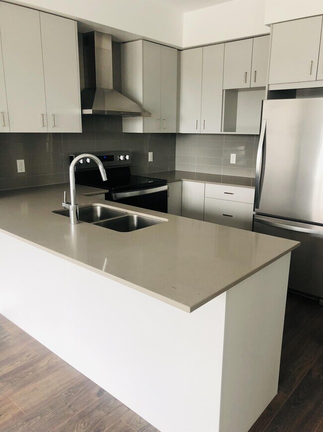 Building Photo - 50-650 Grand Ave S